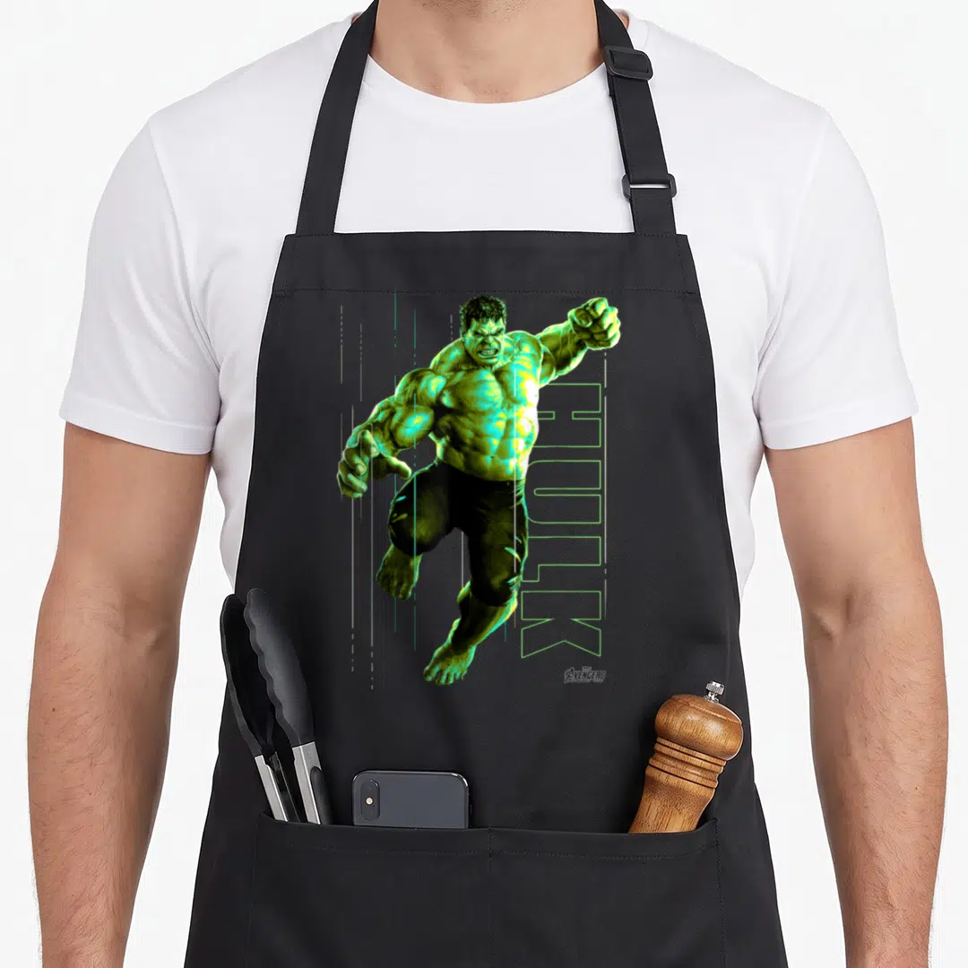 Incredible infinity apron - Realistic green Hulk figure with vertical HULK text and thin lines — shown on a black cotton canvas apron against a white background