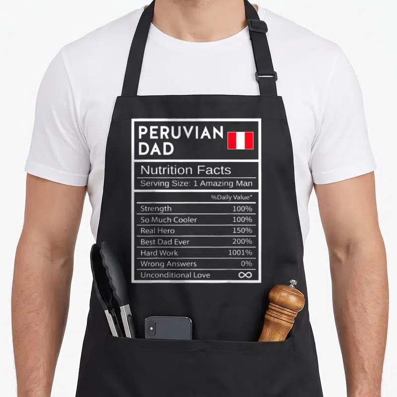 Peruvian nutrition pride apron - Typography style nutrition label for Peruvian Dad with red and white flag — shown on a black cotton canvas apron against a white background