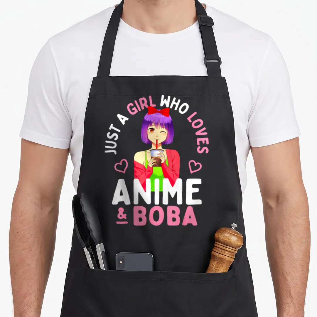 Boba bubble anime apron - Anime girl with purple hair holding boba tea surrounded by just a girl who loves anime — shown on a black cotton canvas apron against a white background