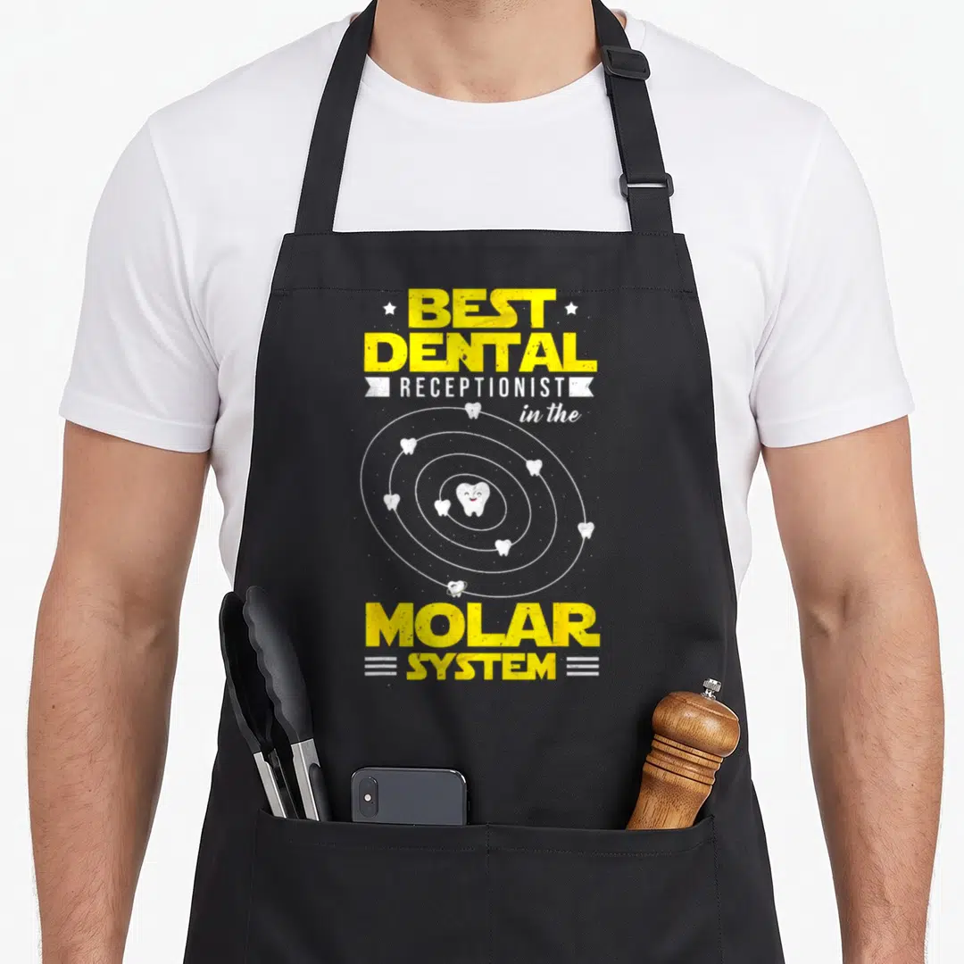 Dental receptionist dentist apron - Distressed yellow text best dental receptionist in the molar system around smiling — shown on a black cotton canvas apron against a white background