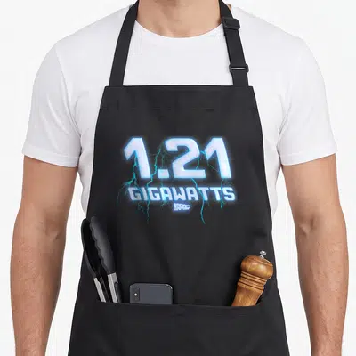 Gigawatt future oil apron - 1.21 Gigawatts text with blue lightning bolts and Back to the Future logo on black fabric — shown on a black cotton canvas apron against a white background