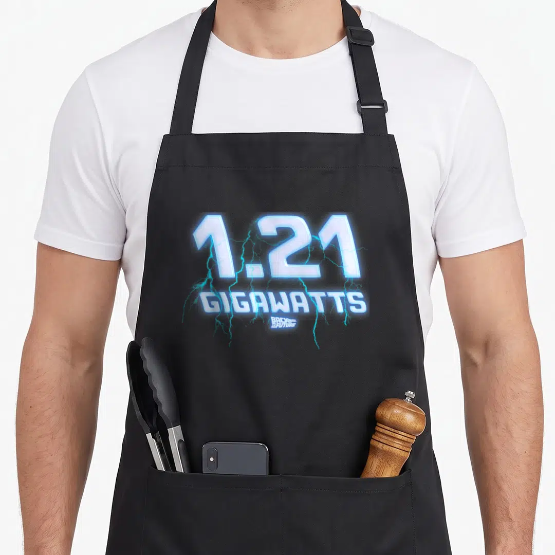 Gigawatt future oil apron - 1.21 Gigawatts text with blue lightning bolts and Back to the Future logo on black fabric — shown on a black cotton canvas apron against a white background