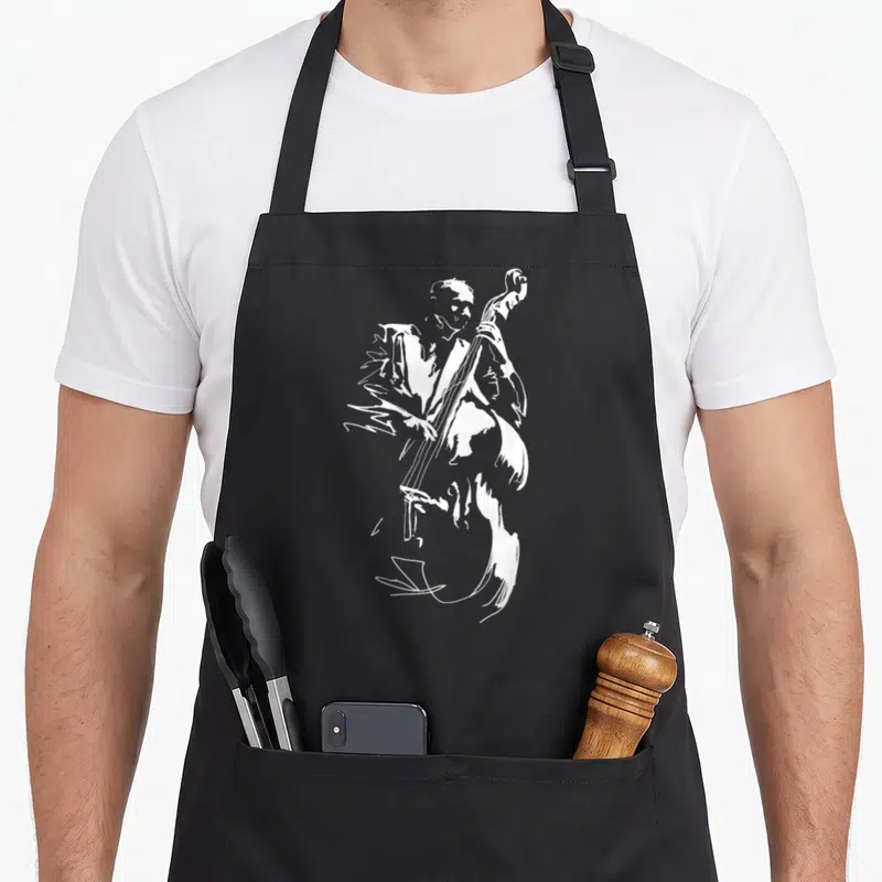 Upright jazz apron - White sketch of a musician playing a double bass on a stiff apron — shown on a black cotton canvas apron against a white background