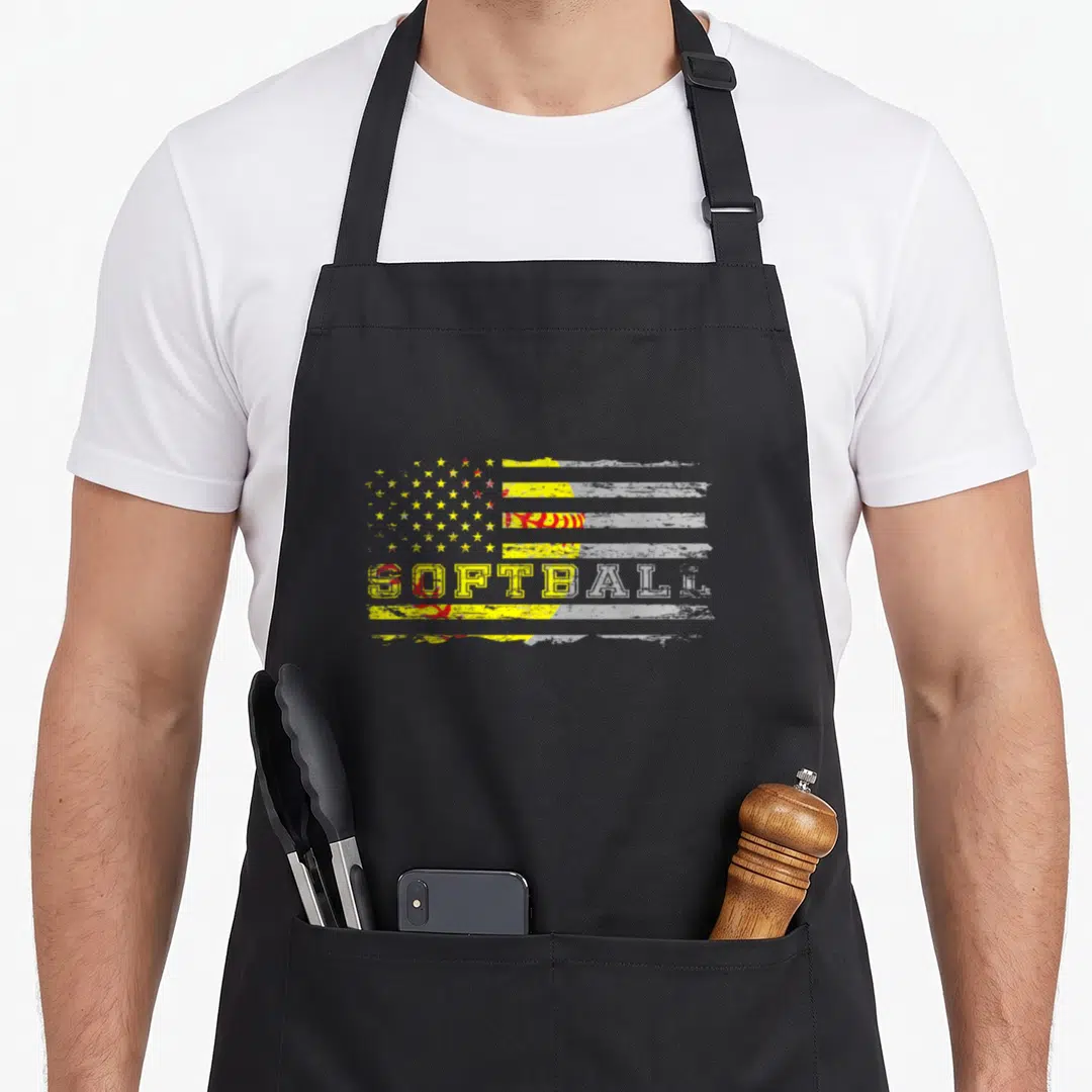 Fan american flag apron - Distressed flag with SOFTBALL text and red yellow stripes — shown on a black cotton canvas apron against a white background