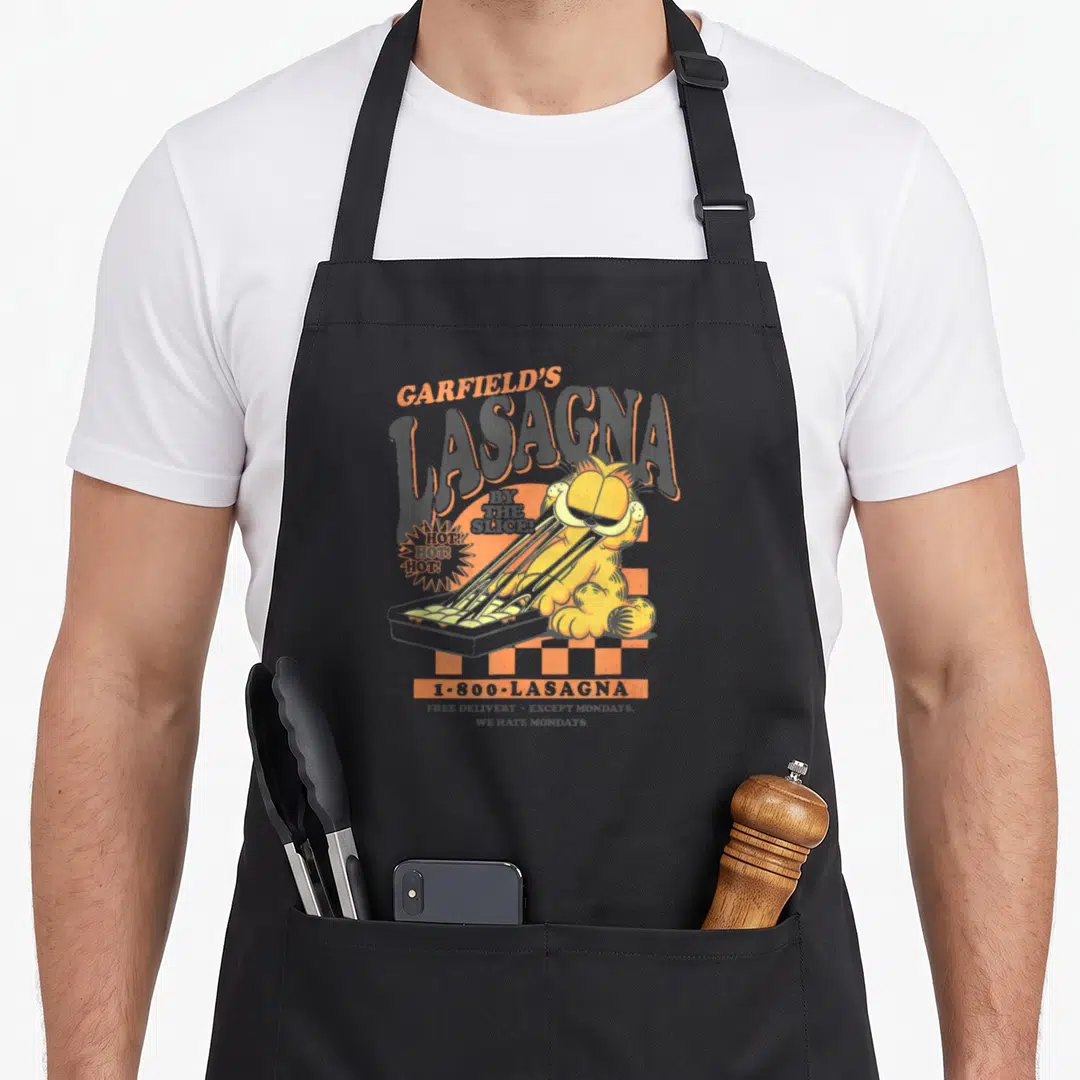 Slice lasagna apron - Garfield pulling cheese from a pan with arching text and phone number on grey background — shown on a black cotton canvas apron against a white background