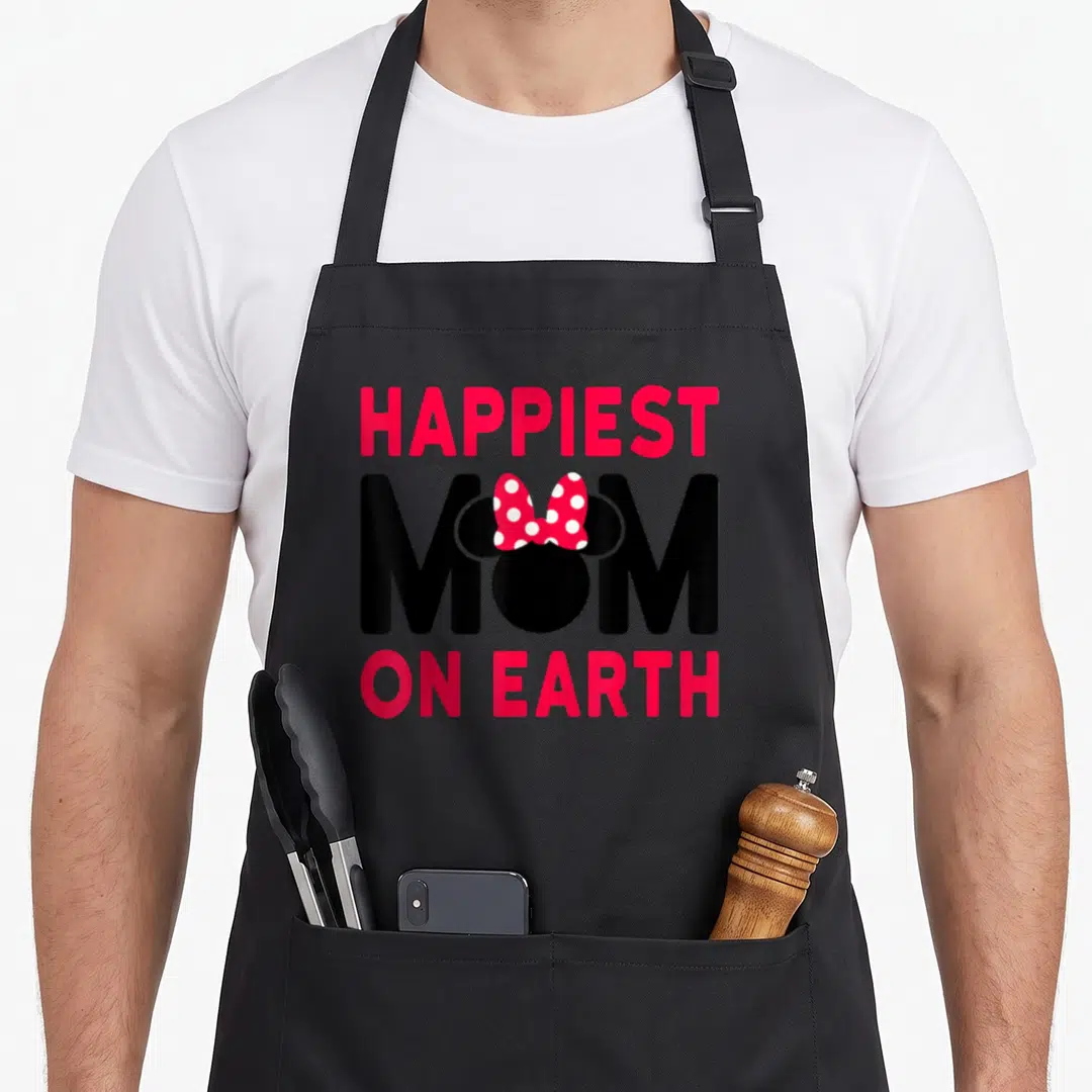 Happiest mother's day aprons - Red and black text reading Happiest Mom On Earth with Minnie Mouse head replacing the O — shown on a black cotton canvas apron against a white background