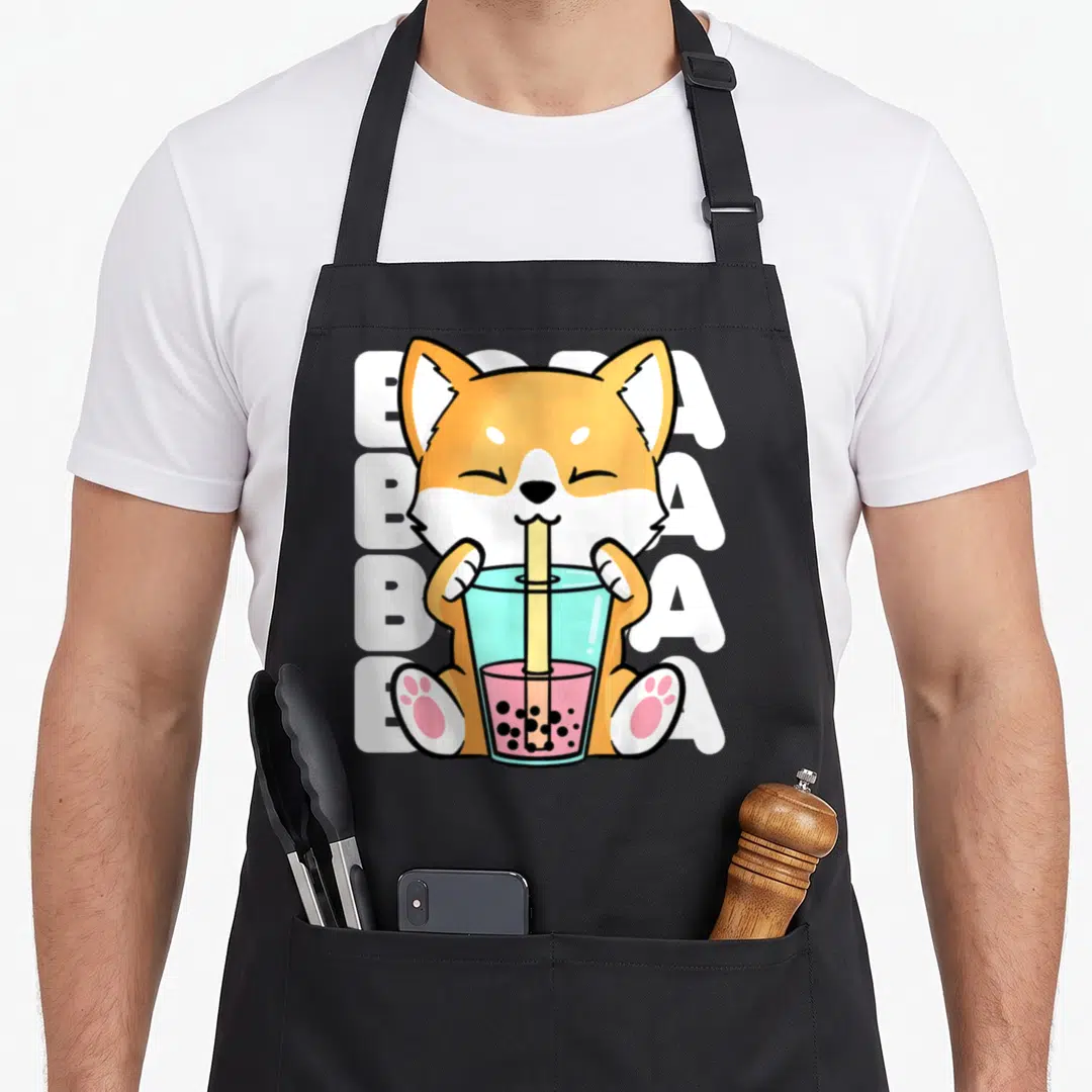 Shiba japan apron - Cartoon shiba inu holding bubble tea with BUBBA text in orange and blue — shown on a black cotton canvas apron against a white background