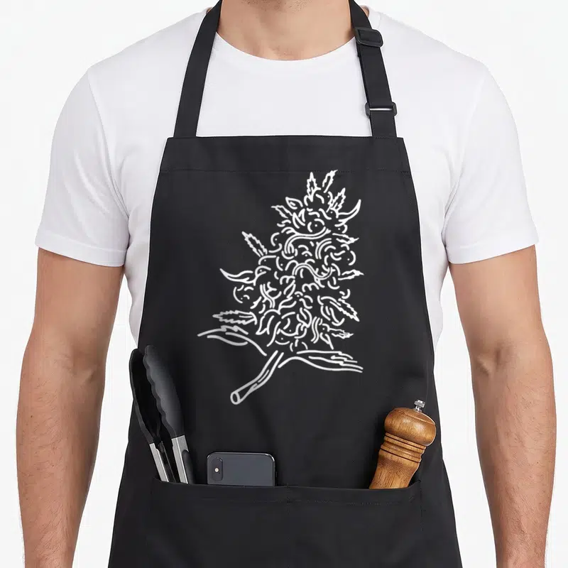 Bud smoking apron - white line-art cannabis bud with stem, no text, minimalist botanical sketch — shown on a black cotton canvas apron against a white background