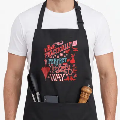 Practically mary poppins apron - Red and blue typography reading PRACTICALLY PERFECT IN Every WAY with a woman — shown on a black cotton canvas apron against a white background