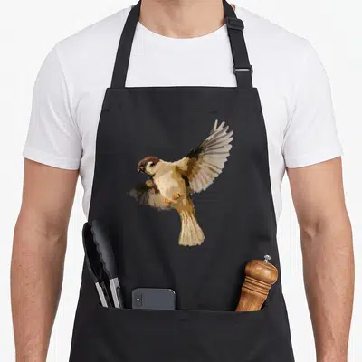 Funny sparrow bird apron - Realistic brown and beige house sparrow flying with spread wings — shown on a black cotton canvas apron against a white background