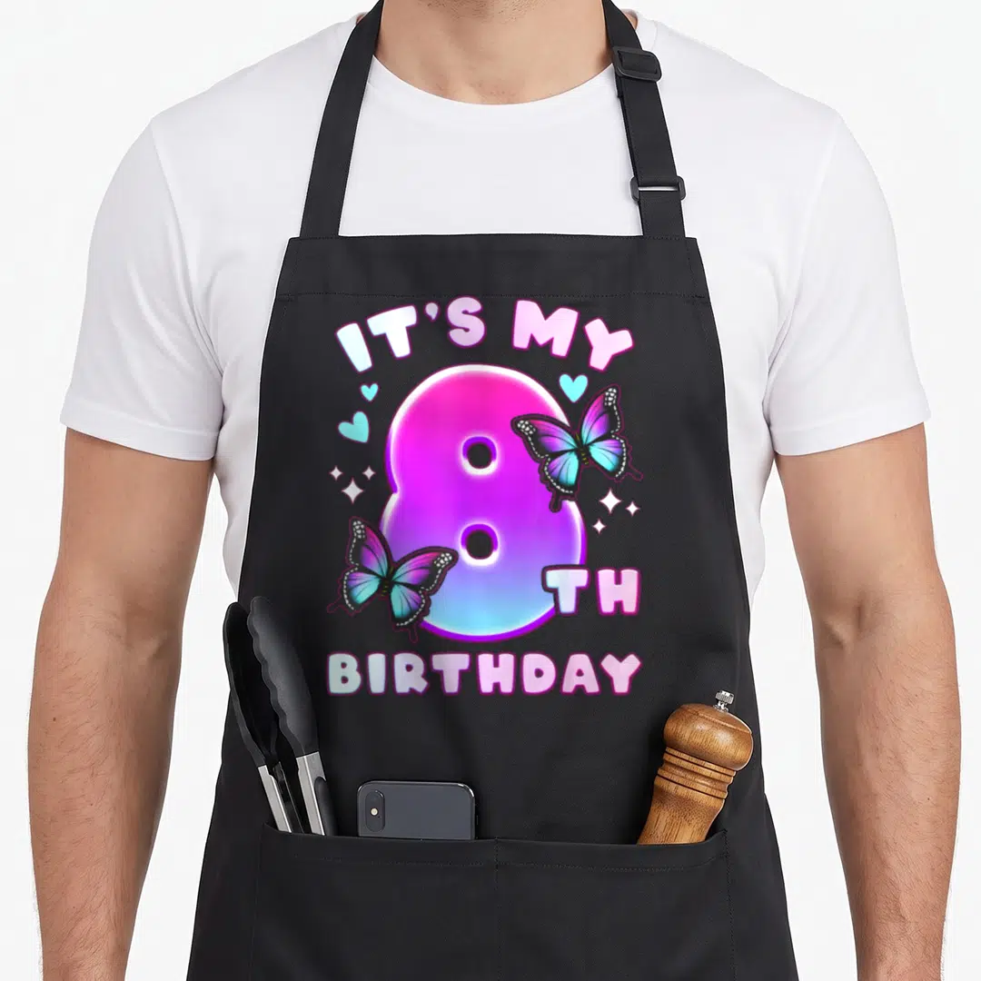 Number butterfly aprons - Colorful number 8 with IT'S MY 8TH BIRTHDAY text surrounded by pink and blue butterflies — shown on a black cotton canvas apron against a white background