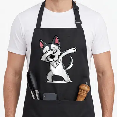 Dabbing funny wolves for wolf lovers apron - Cartoon husky standing and dabbing with white grey black pink colors — shown on a black cotton canvas apron against a white background
