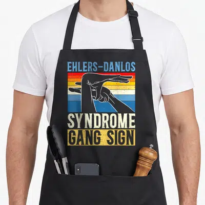 Danlo eds awareness apron - Retro graphic of hyper-extended hands over blue red orange yellow striped background — shown on a black cotton canvas apron against a white background