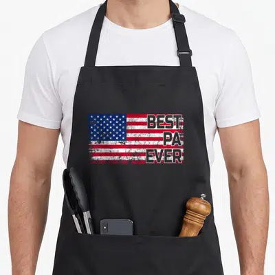 Christmas father day apron - Distressed USA flag with stacked BEST PA EVER text in grey outline — shown on a black cotton canvas apron against a white background