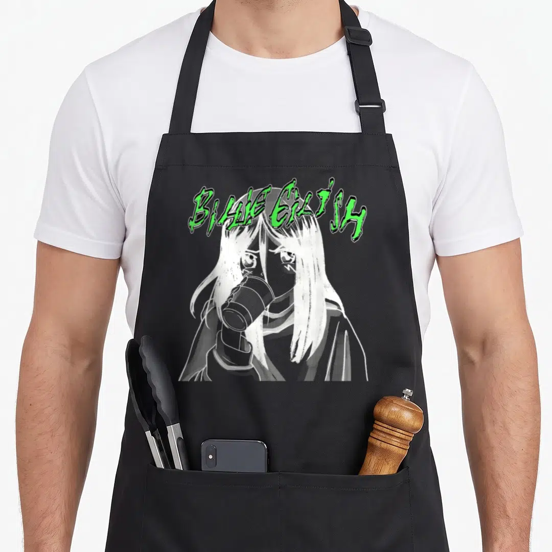 Billie coffee apron - Green arched text BILLIE EILISH above a white cartoon woman holding a cup on grey background — shown on a black cotton canvas apron against a white background
