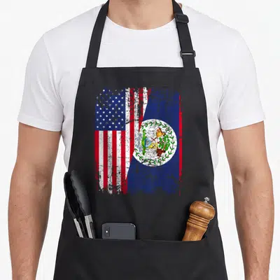 Belizean american flag apron - Merged US and Belize flags with distressed texture and coat of arms in blue red white — shown on a black cotton canvas apron against a white background