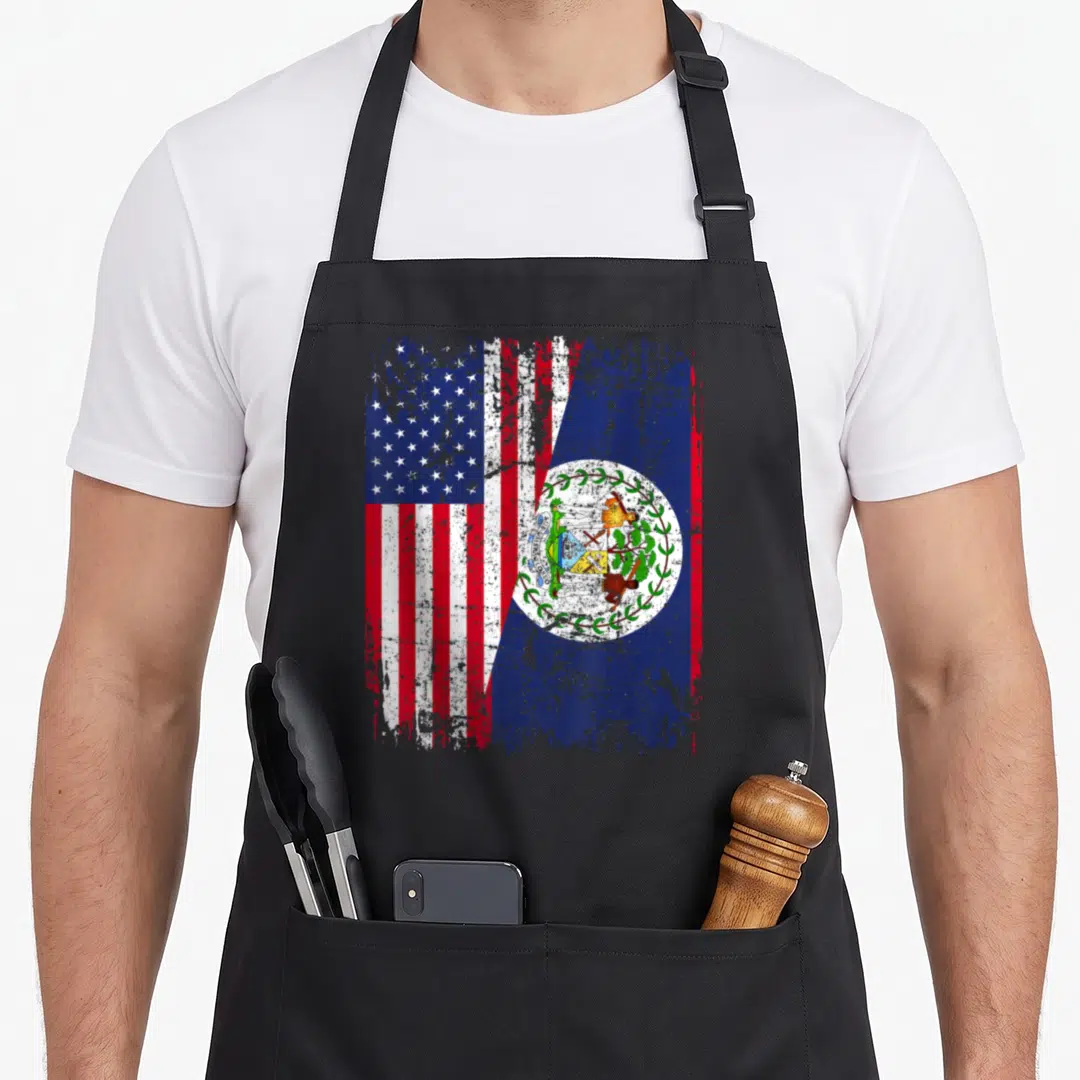 Belizean american flag apron - Merged US and Belize flags with distressed texture and coat of arms in blue red white — shown on a black cotton canvas apron against a white background