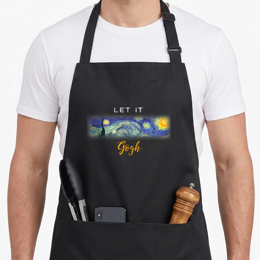 Vincent starry van gogh apron - Starry Night painting crop with LET IT Gogh text in blue yellow white — shown on a black cotton canvas apron against a white background