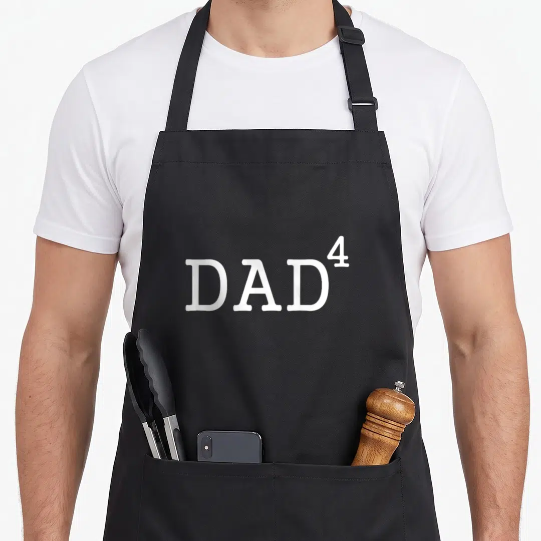 4th math dad apron - White DAD superscript 4 text on black background — shown on a black cotton canvas apron against a white background