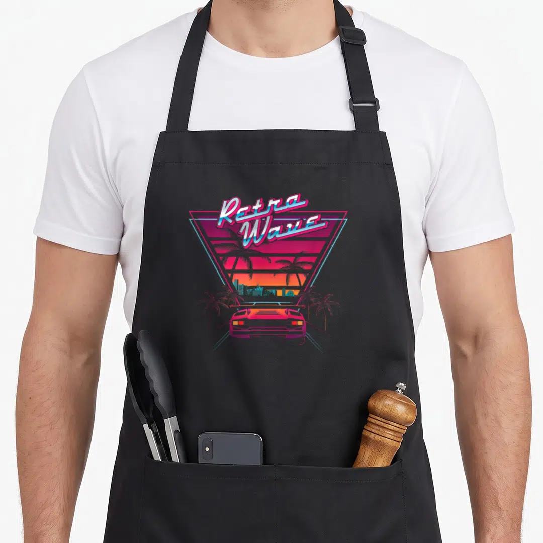 Synthwave 80s apron - Retro Wave text over car in inverted triangle with sunset, skyline, palms in pink blue purple — shown on a black cotton canvas apron against a white background