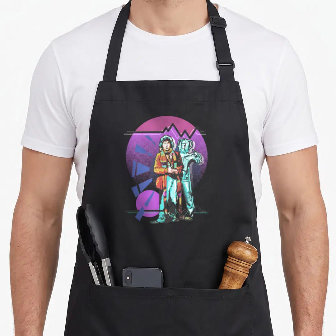 Pop baker apron - Cartoon man and robot standing before purple circle with blue shards and grey zigzags — shown on a black cotton canvas apron against a white background