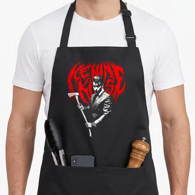 Psycho ice nine kills apron - Man holding axe in front of red heart text GENUINE KISS line art — shown on a black cotton canvas apron against a white background