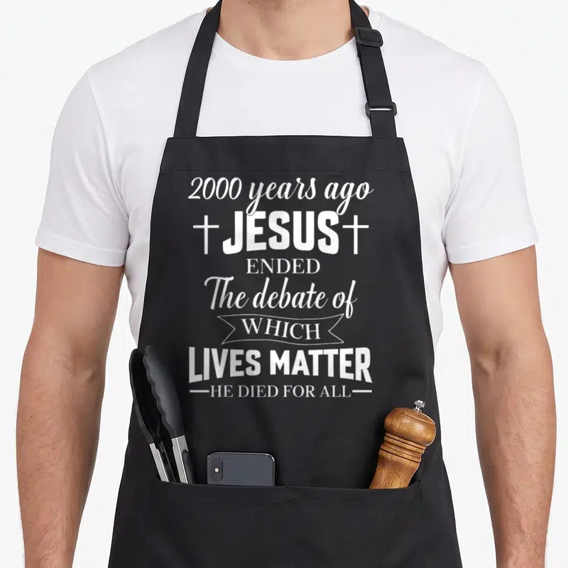 Ended christian apron - White stacked text reading 2000 years ago Jesus ended debate of which lives matter with two — shown on a black cotton canvas apron against a white background