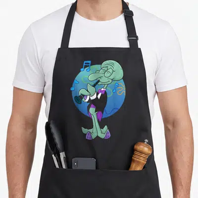 Squidward clarinet apron - Green cartoon octopus in tuxedo playing black clarinet with blue notes on blue circle — shown on a black cotton canvas apron against a white background