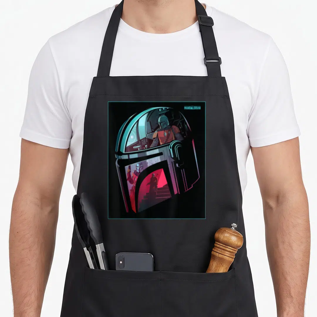 Neon star war apron - Mandalorian helmet art with internal spaceship scenes in black blue red silver — shown on a black cotton canvas apron against a white background