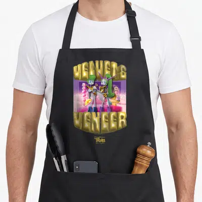 Troll velvet apron - Velvet and Veneer characters in gold text surrounded by purple gems and stars — shown on a black cotton canvas apron against a white background