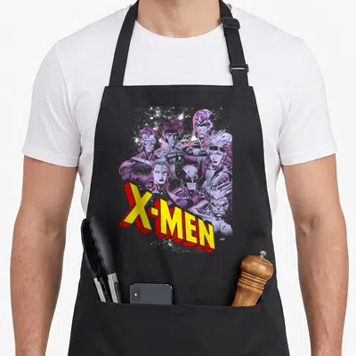 Cute x apron - Yellow 3D X-MEN text over purple monochromatic superhero group art — shown on a black cotton canvas apron against a white background
