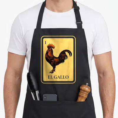 Mexican bingo aprons - Yellow card with black rooster, number 1 top left, El Gallo text bottom — shown on a black cotton canvas apron against a white background
