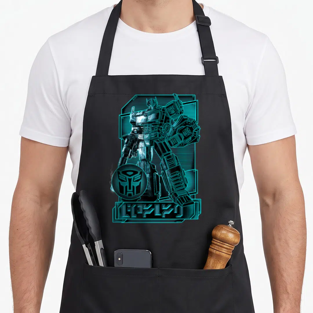War cybertron transformer apron - Cyan and black LEOPRIME robot with Autobot logo and stylized banner text — shown on a black cotton canvas apron against a white background