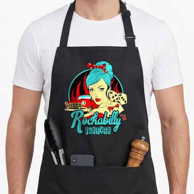 Pin rockabilly apron - Cartoon woman with blue hair, red car, dice, and red flames with Rockabilly text — shown on a black cotton canvas apron against a white background
