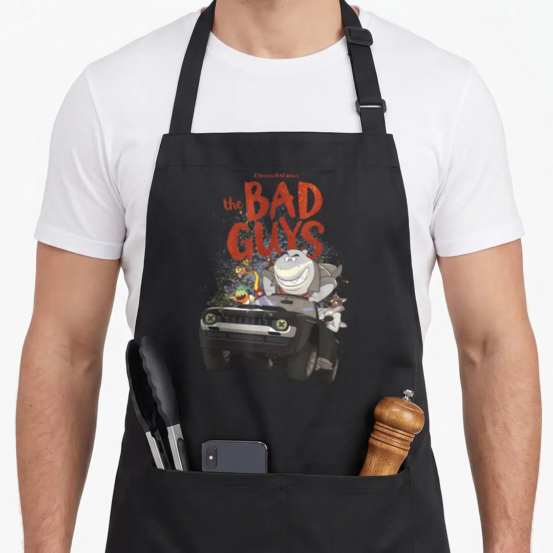 Getaway vehicle apron - Cartoon shark and animals in black car with stacked red text the BAD GUYS — shown on a black cotton canvas apron against a white background