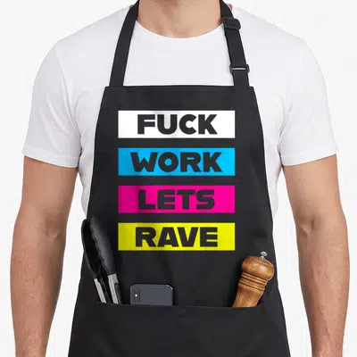 Rave edm apron - Four stacked white blue pink and yellow rectangles with grey text reading fuck work lets rave — shown on a black cotton canvas apron against a white background