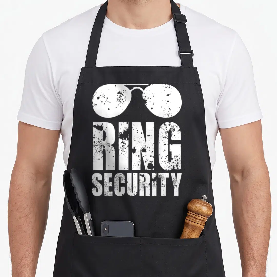 Security funny wedding aprons - White distressed sunglasses above stacked RING SECURITY text — shown on a black cotton canvas apron against a white background