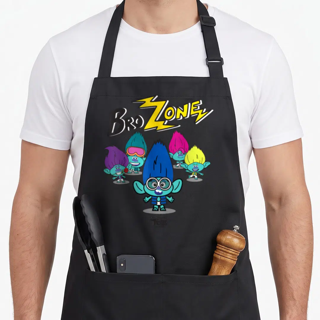 Troll spotlight apron - BroZONE text with yellow lightning bolt above five cartoon trolls with colorful hair — shown on a black cotton canvas apron against a white background