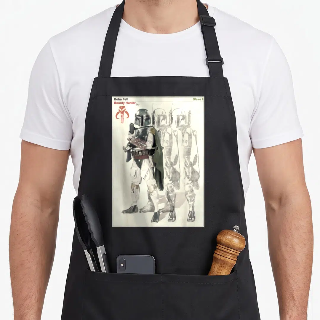 Poster hunter apron - Boba Fett standing with two faded sketches and text reading Slave I and Bounty Hunter — shown on a black cotton canvas apron against a white background