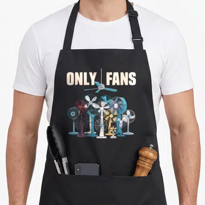 Fan joke apron - ONLY FANS text split by ceiling fan above cluster of electric fans in blue and white cartoon style — shown on a black cotton canvas apron against a white background