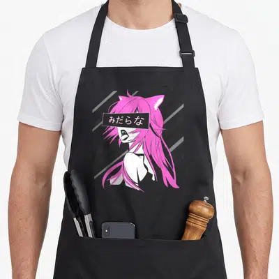 Lewd cat apron - Pink anime girl with cat ears and rectangular text box over eyes on striped background — shown on a black cotton canvas apron against a white background