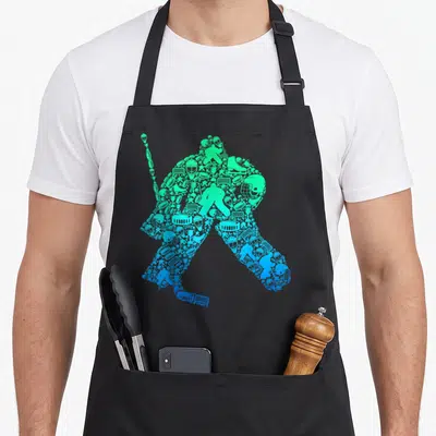 Ice goalie apron - Hockey player silhouette formed by green and blue equipment icons like skates and masks — shown on a black cotton canvas apron against a white background