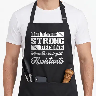 Assistant anesthesiologist humor apron - White stacked text reading Only The Strong Become Anesthesiologist Assistants — shown on a black cotton canvas apron against a white background