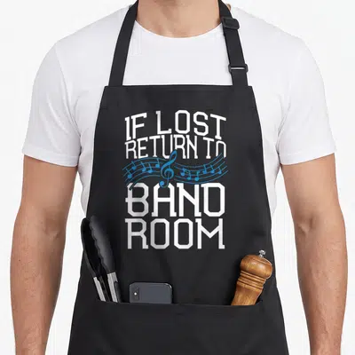 Lost brass band apron - White stacked text If Lost Return To Band Room with blue treble clef and musical notes — shown on a black cotton canvas apron against a white background