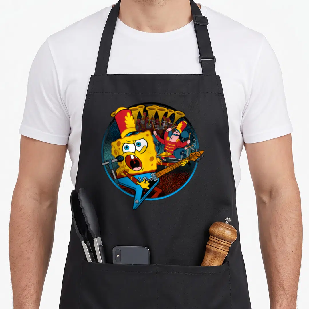 Squarepant bowl apron - SpongeBob playing guitar and Patrick drumming inside a circular frame with brass instruments — shown on a black cotton canvas apron against a white background