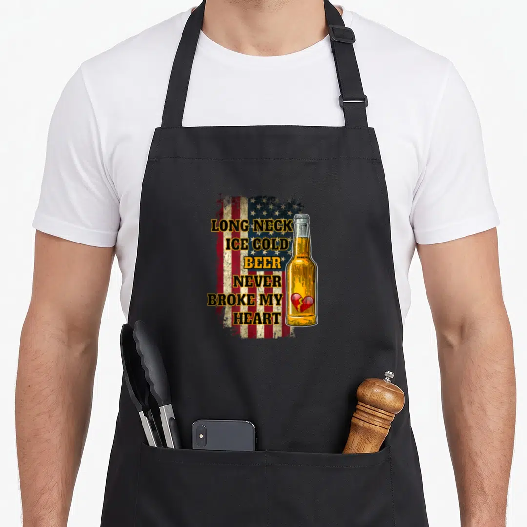 Ice beer apron - Distressed flag with stacked text and yellow bottle containing a red broken heart — shown on a black cotton canvas apron against a white background
