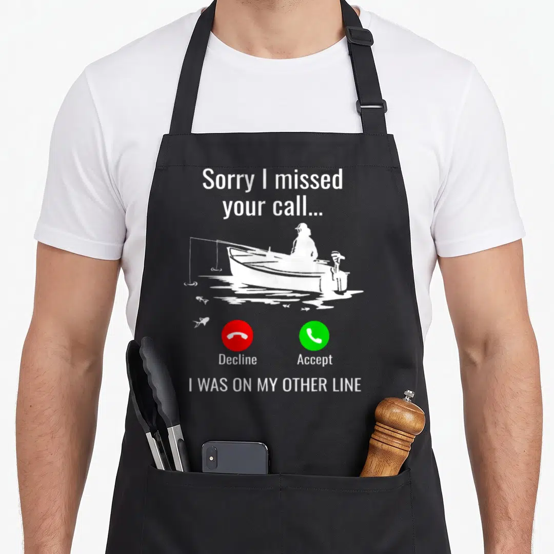 Call fishing aprons - Fisherman in boat with Sorry I missed your call text and red decline green accept buttons — shown on a black cotton canvas apron against a white background