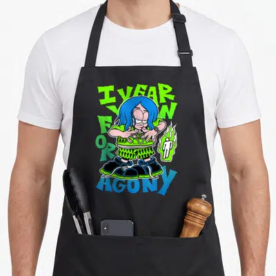 Eilish world music apron - I FEAR FOR AGONY text with blue-haired cartoon character and flaming stick figure in lime — shown on a black cotton canvas apron against a white background