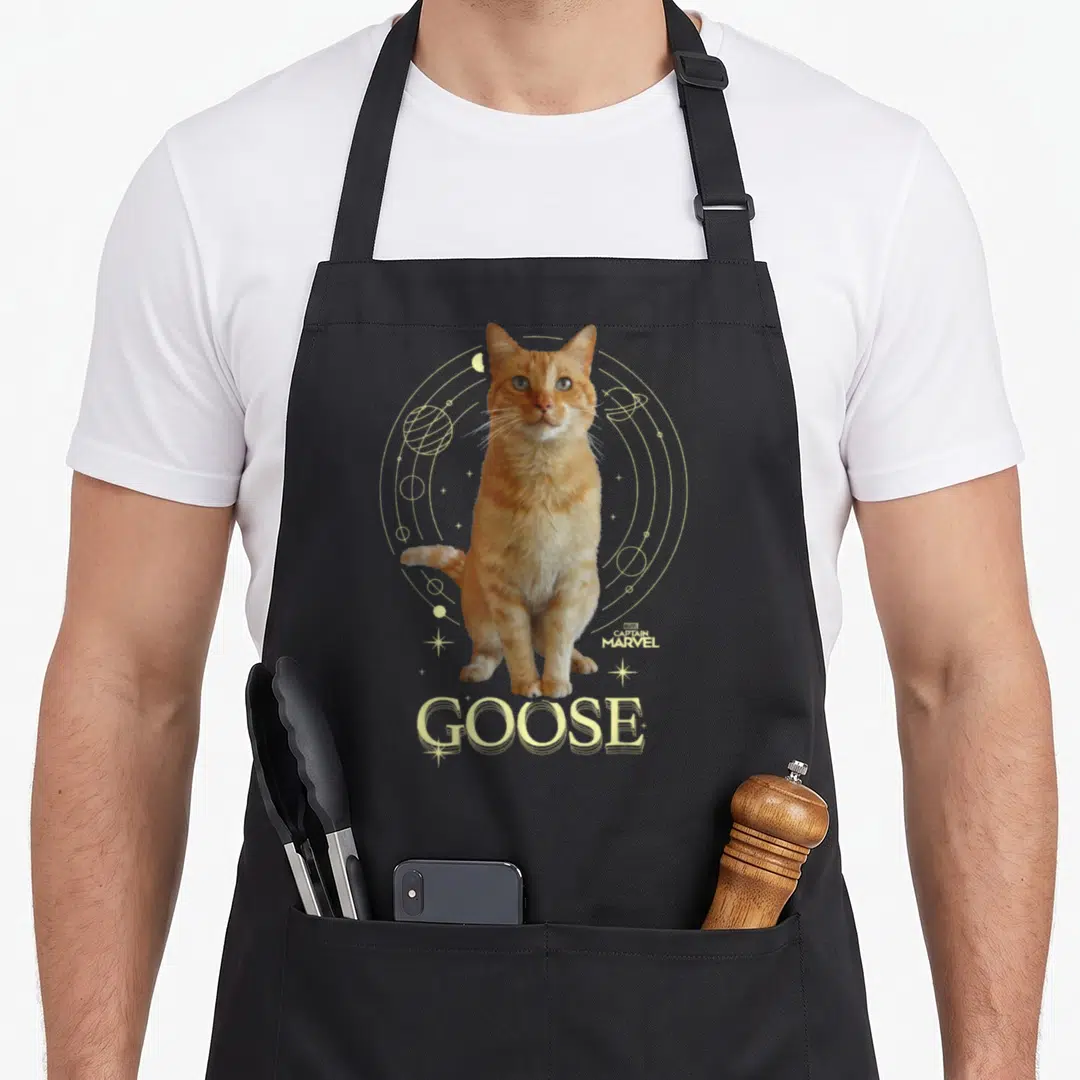Portrait goose apron - Orange cat photo inside gold orbital lines with GOOSE text — shown on a black cotton canvas apron against a white background