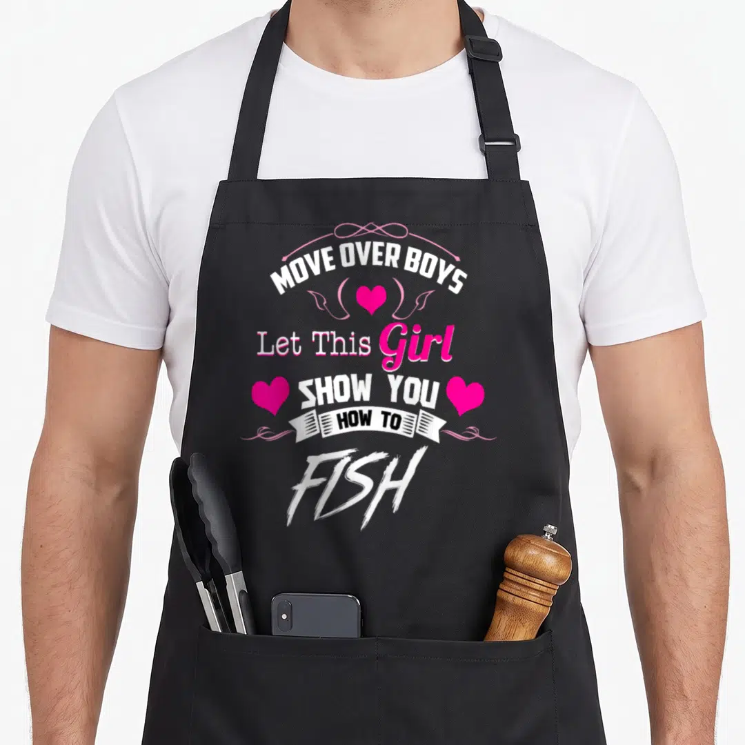 Move fishing aprons - Stacked text move over boys let this girl show you how to fish with pink hearts — shown on a black cotton canvas apron against a white background